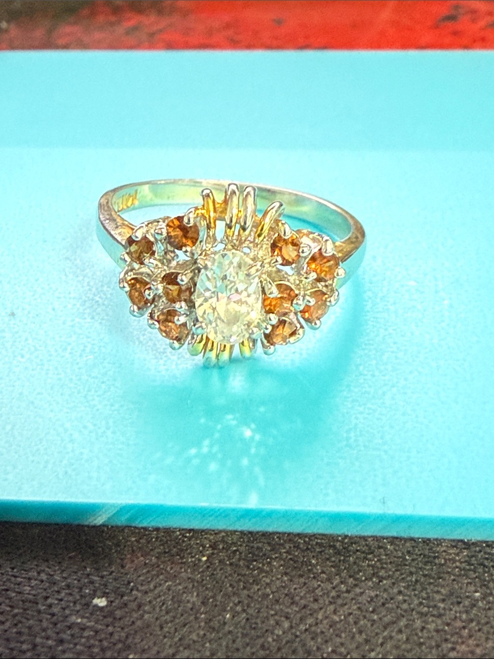 14 Karat Gold Oval Clear Center Ring with accent Stones